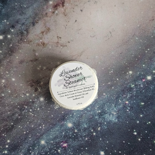 Invigorating Shower Steamers – handcrafted aromatherapy tablets infused with lavender essential oils for a spa-like shower experience, available in multiple mood-enhancing blend.