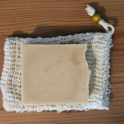 Homestead Comforts Soap Saver Pouch | Exfoliating Bag for Longer Soap Use | with soap demo placed on top