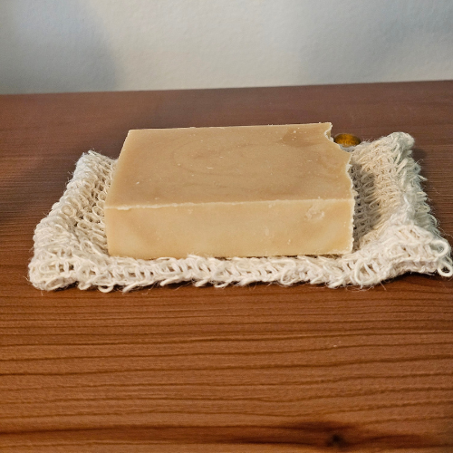 Homestead Comforts Soap Saver Pouch | Exfoliating Bag for Longer Soap Use | pictured with Turmeric Soap