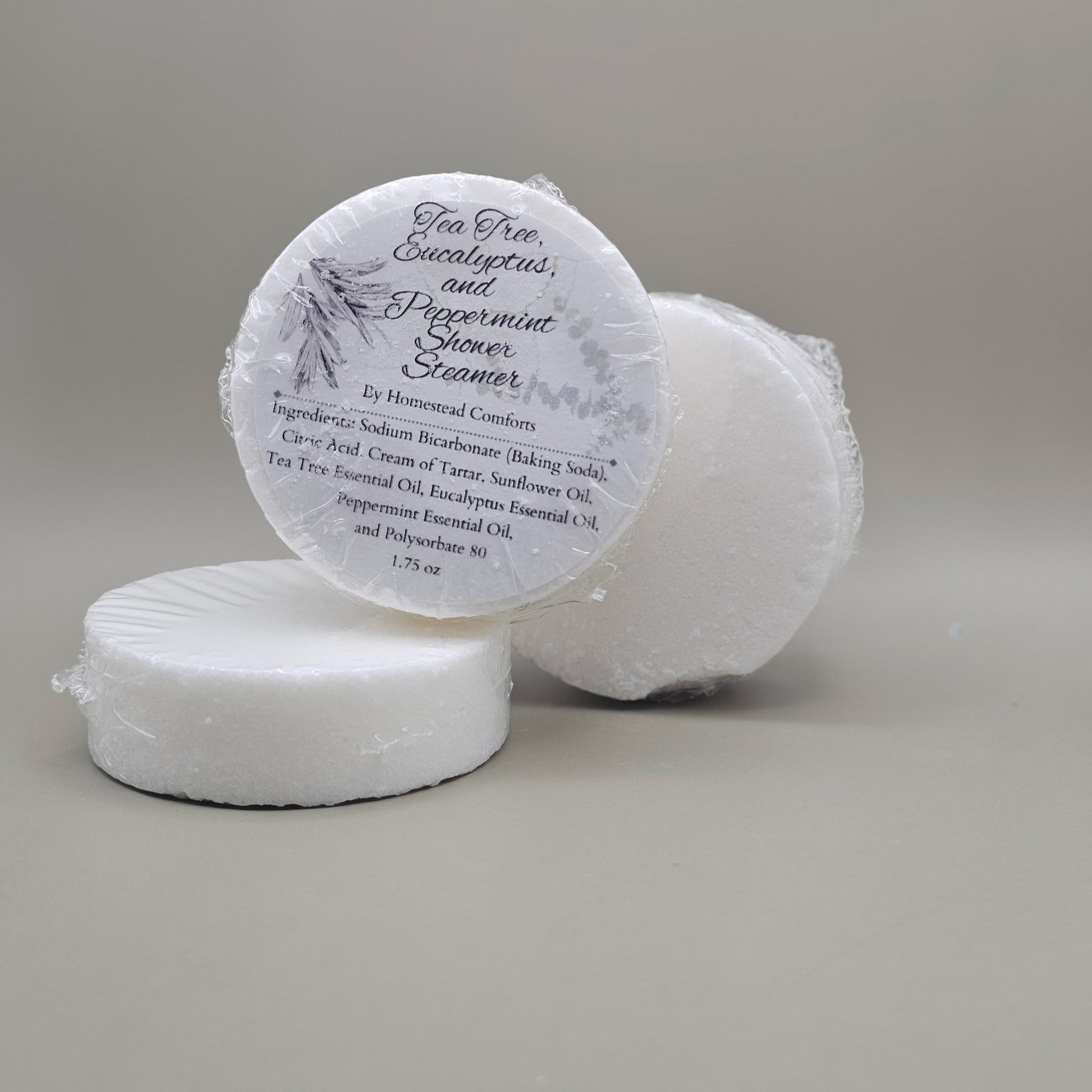 Invigorating Shower Steamers – handcrafted aromatherapy tablets infused with tea tree, eucalyptus and peppermint essential oils for a spa-like shower experience, available in multiple mood-enhancing blends.